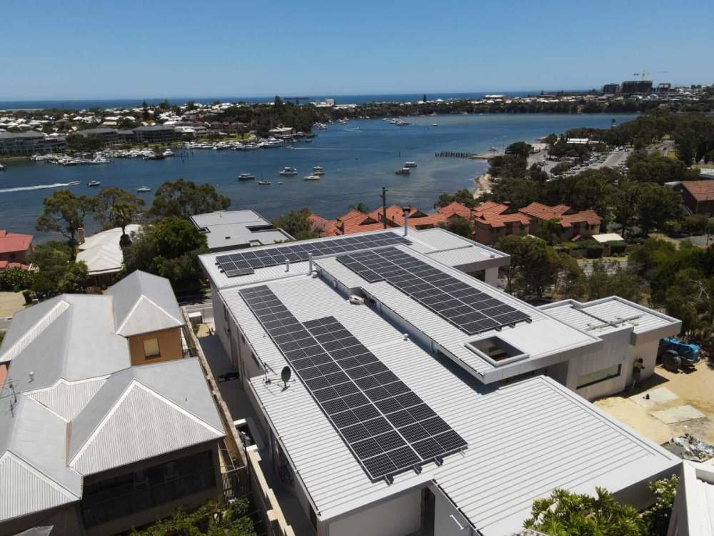 Large rooftop solar installation overlooking the coast